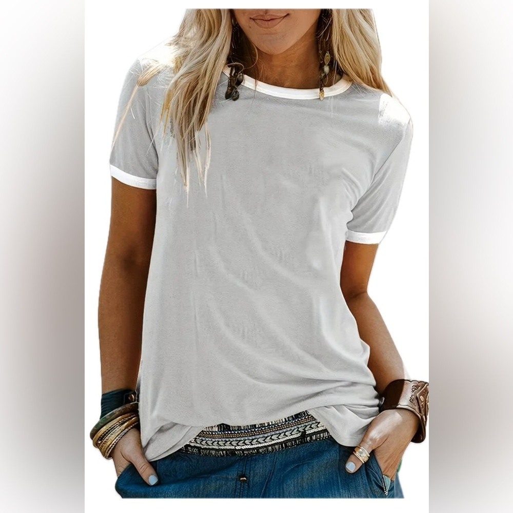 Grey tshirt with white trim. Women’s size medium.